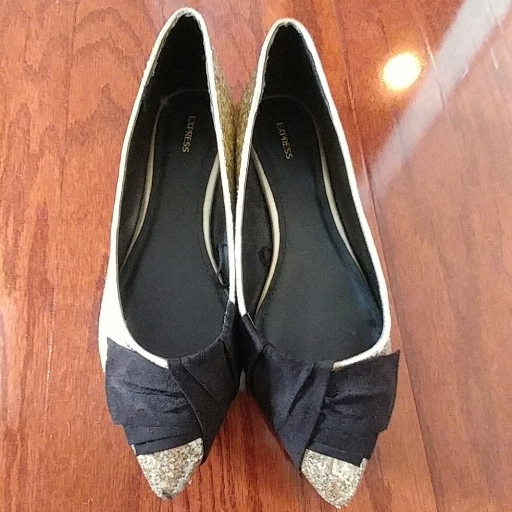 Gold glitter flats with black velvet bow